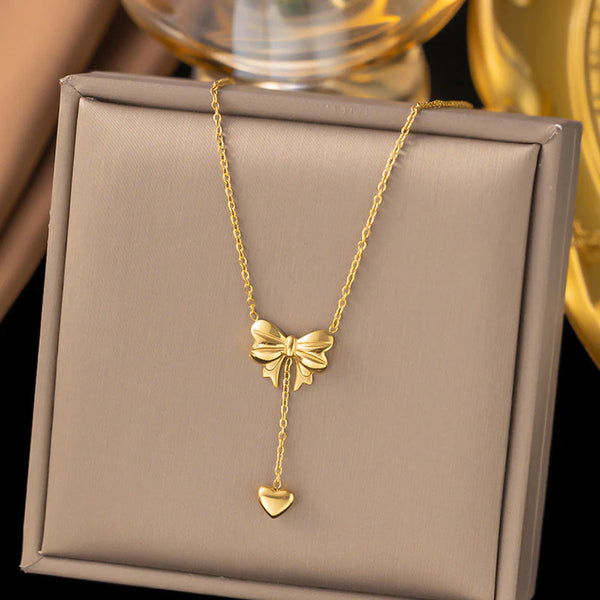 Gold Toned Anti Tarnish Heart Themed Bow inspired Pendant Necklace