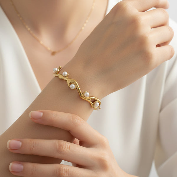 Gold Plated Wavy Cuff Bracelet with Imitation Pearls