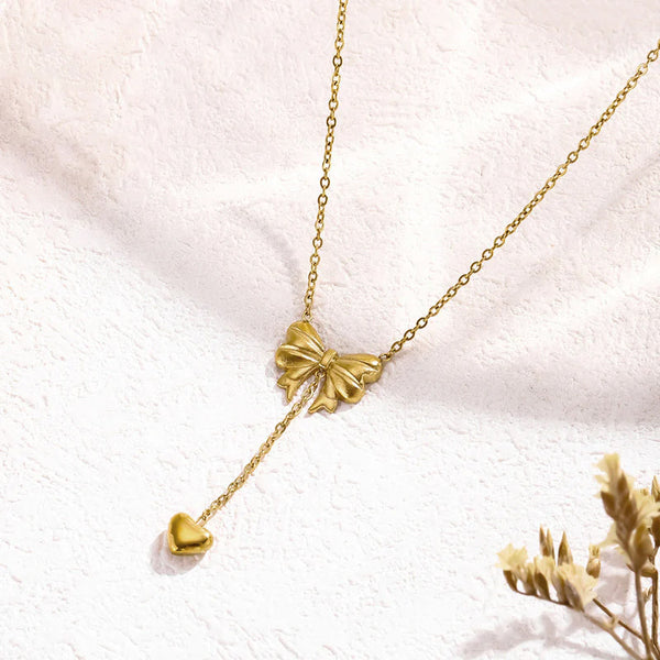 Gold Toned Anti Tarnish Heart Themed Bow inspired Pendant Necklace
