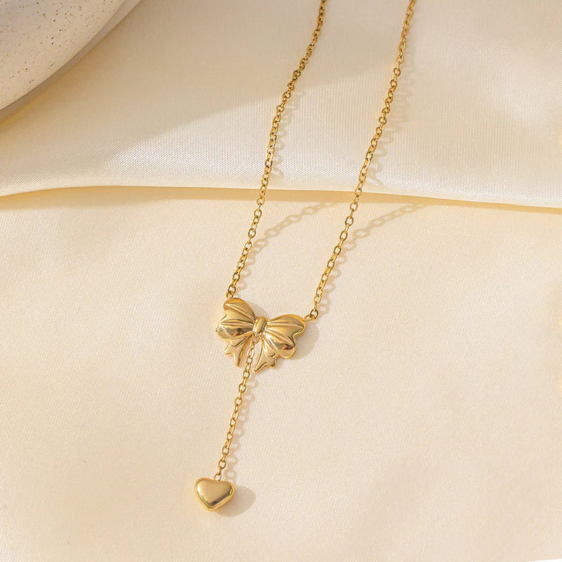 Gold Toned Anti Tarnish Heart Themed Bow inspired Pendant Necklace