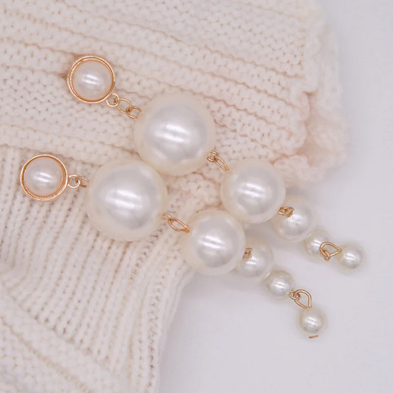 Scintillating Statement Gold-Toned Long Pearl Drop Earrings