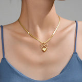 Gold Toned Anti Tarnish Snake Chain Necklace with Bow and Heart Pendant
