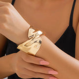 Gold-Toned Sculpted Statement Cuff Bracelet with Contemporary Wrap Design