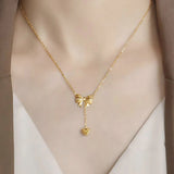 Gold Toned Anti Tarnish Heart Themed Bow inspired Pendant Necklace