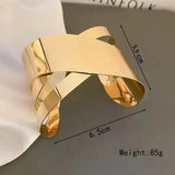 Gold-Toned Bangle-Style Cuff Bracelet with Contemporary Wrap Design