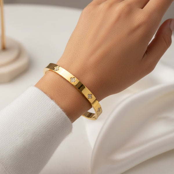 Gold Plated Bangle Bracelet with Cubic Zirconia Flower Accents