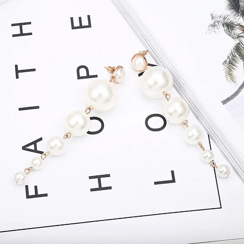 Scintillating Statement Gold-Toned Long Pearl Drop Earrings