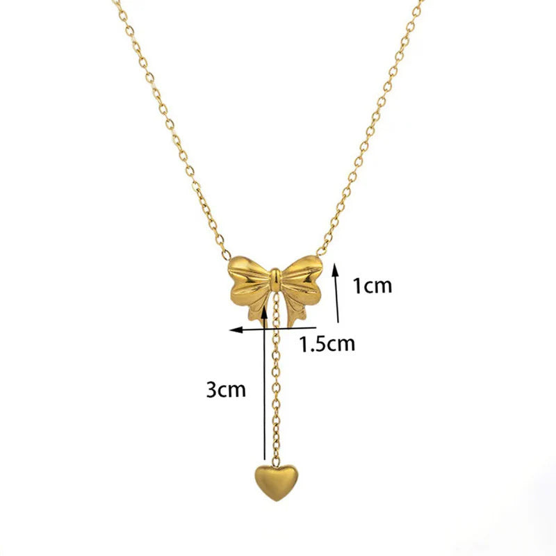 Gold Toned Anti Tarnish Heart Themed Bow inspired Pendant Necklace
