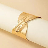 Gold-Toned Sculpted Statement Cuff Bracelet with Contemporary Wrap Design