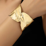 Gold-Toned Sculpted Statement Cuff Bracelet with Contemporary Wrap Design