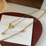 Gold Toned Anti Tarnish Heart Themed Bow inspired Pendant Necklace