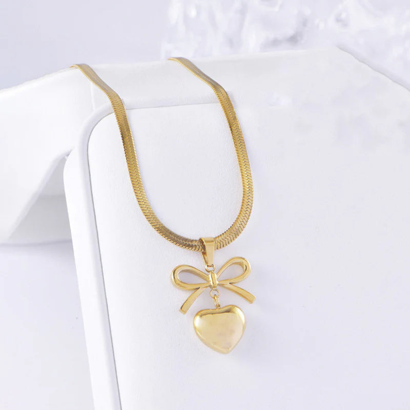 Gold Toned Anti Tarnish Snake Chain Necklace with Bow and Heart Pendant
