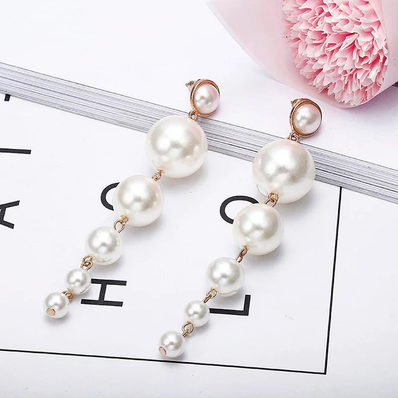 Scintillating Statement Gold-Toned Long Pearl Drop Earrings