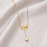 Gold Toned Anti Tarnish Heart Themed Bow inspired Pendant Necklace