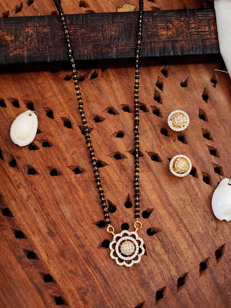 Elegant Floral Pendant with Matching Earrings