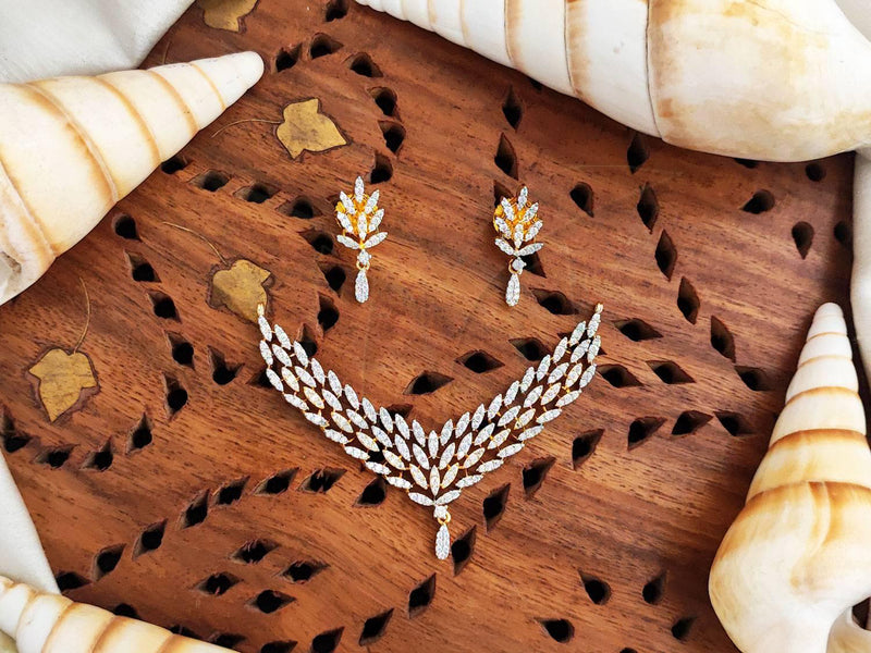 Elegant Leaf Motif CZ Pendant Set with Matching Earrings